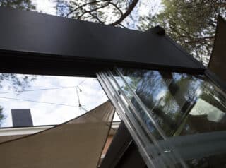 cortina de cristal corredera plegada