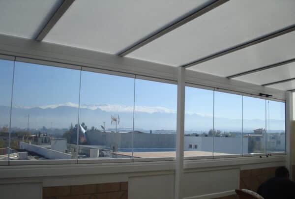 terraza techo fijo cortina cristal