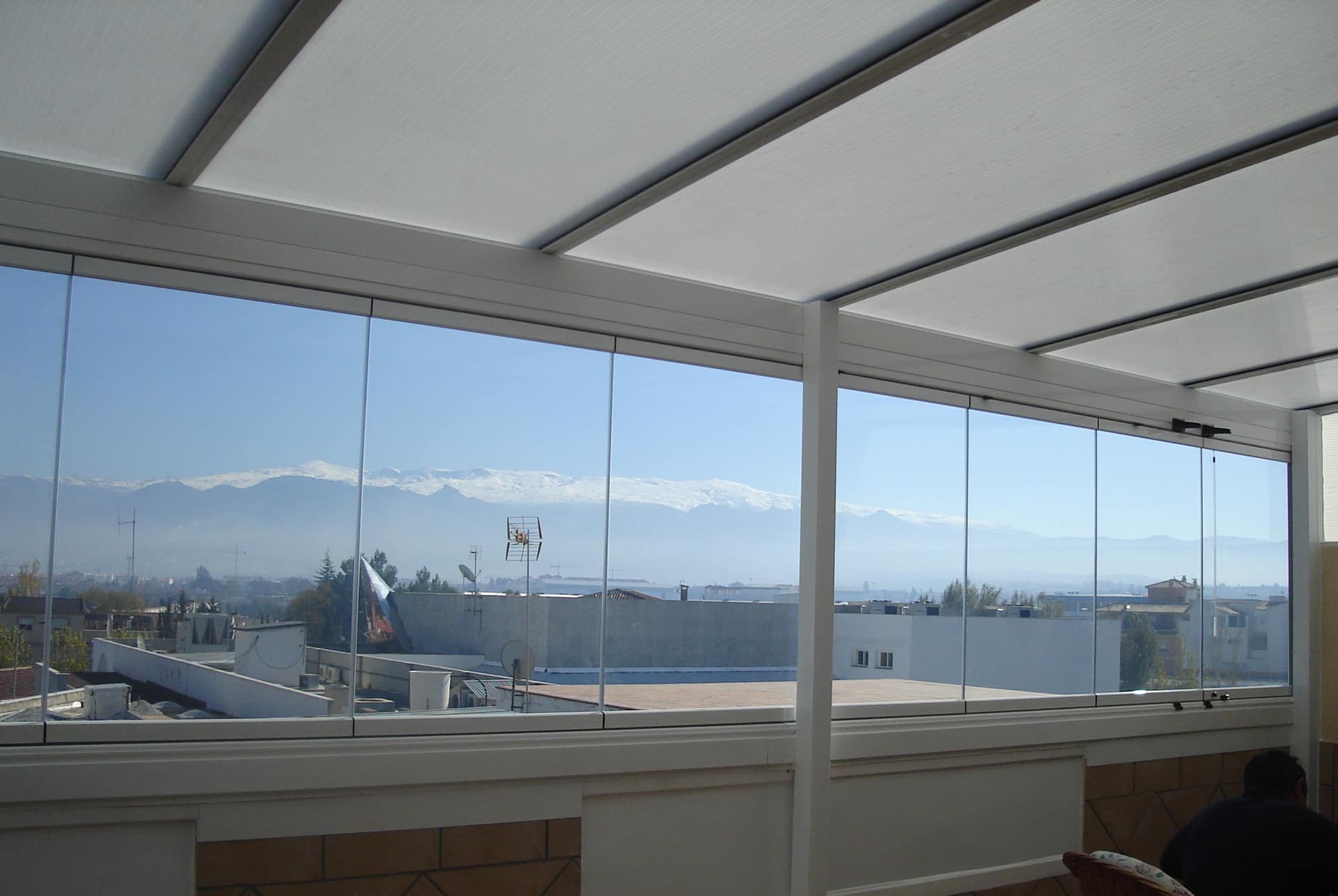 terraza techo fijo cortina cristal
