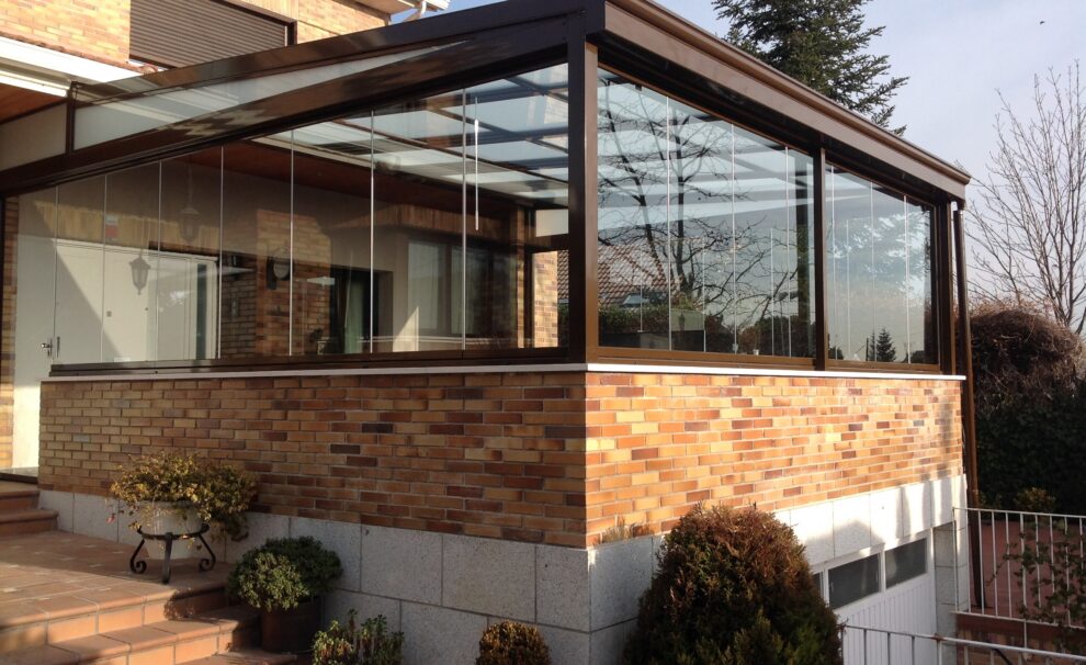 Cortina de cristal y techo corredizo